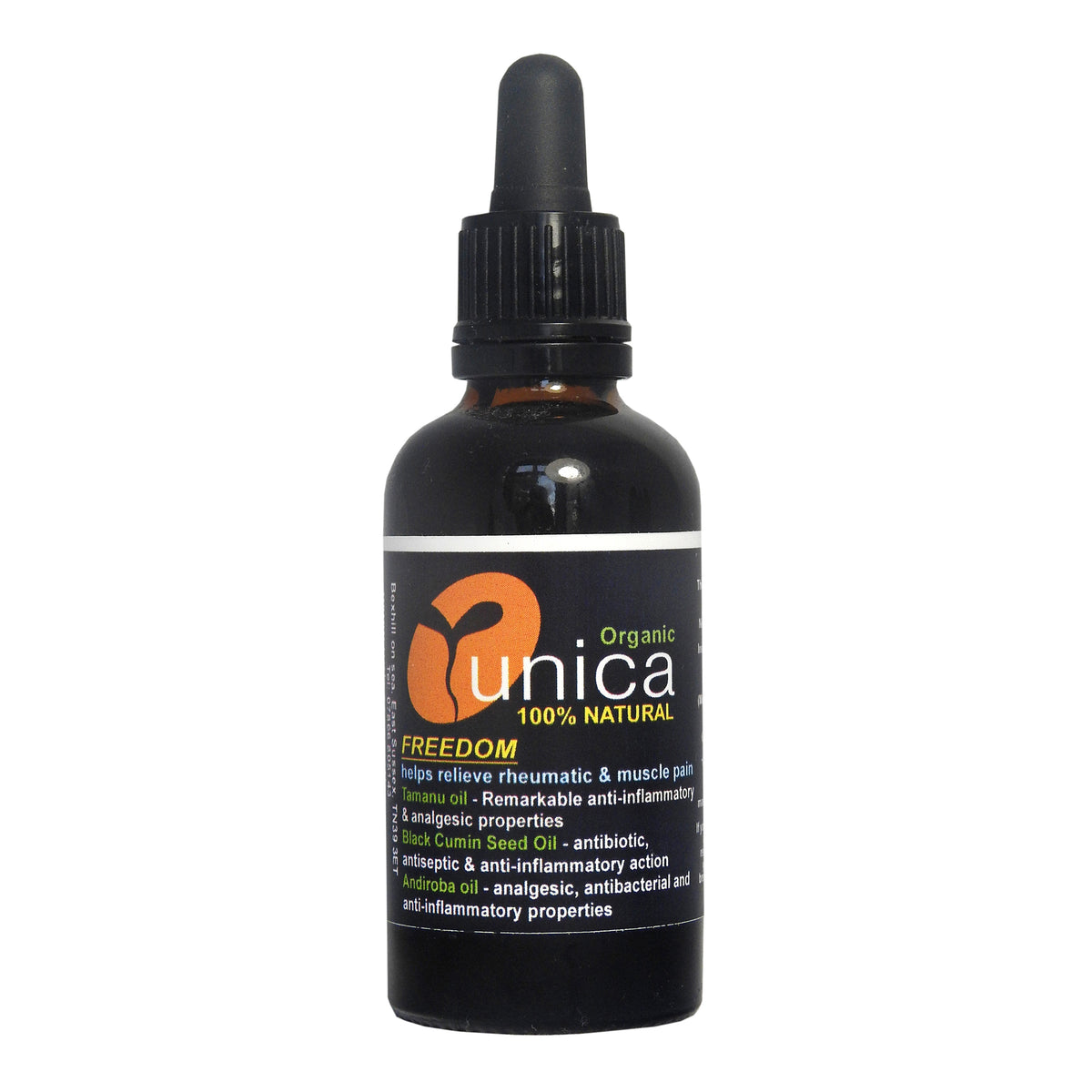 Organic oil for muscle joint pain with tamanu and black seed oil in dropper bottle.